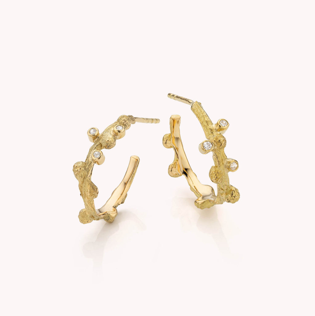 gouden creolen met diamant