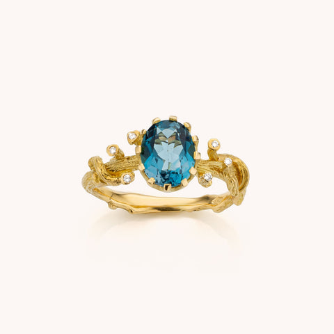 geelgouden ring met topaas en diamant